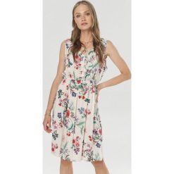 Kremowa Sukienka Pirepise. Brązowe sukienki Born2be, na imprezę, l, bez wzorów, bez kołnierzyka, bez ramiączek, mini. Za 79.99 zł.