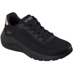 Buty sportowe damskie Skechers Bobs Squad Waves current Look. Czarne buty treningowe Skechers, bez wzorów, z materiału, bez zapięcia. Za 199.00 zł.