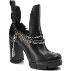 Czarne Botki Carinii Eleganckie Skórzane Buty Na Słupku. Czarne botki Carinii, bez wzorów, eleganckie, bez obcasa, na słupku, bez zapięcia. Za 499.00 zł.