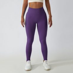 Legginsy treningowe modelujące sylwetkę z wysokim stanem Gulli. Brązowe legginsy Intica, bez wzorów, z tkaniny, sportowe. Za 139.00 zł.