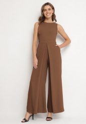 Brązowy Kombinezon Bez Rękawów z Szerokimi Nogawkami i Kieszeniami Veleldia. Brązowe sukienki Born2be, m, bez wzorów, eleganckie, bez kołnierzyka, bez ramiączek. W wyprzedaży za 135.99 zł.