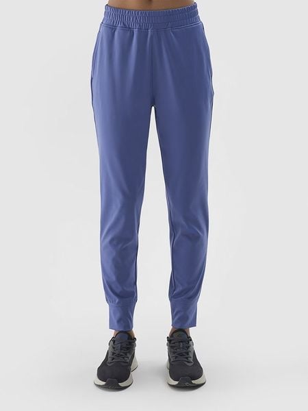 4F Spodnie dresowe w kolorze niebieskim rozmiar: S. Niebieskie spodnie sportowe 4f, bez wzorów, z dresówki. Za 70.57 zł.