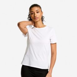 Koszulka z krótkim rękawem damska Domyos Gym & Pilates 100. Białe t-shirty sportowe DOMYOS, m, bez wzorów, z bawełny, bez ramiączek, na fitness i siłownię. Za 19.99 zł.