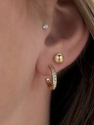 Les Favorites Pozłacane kolczyki-półkreole z cyrkoniami rozmiar: onesize. Kolczyki Les Favorites, z cyrkonią, pozłacane. Za 78.99 zł.