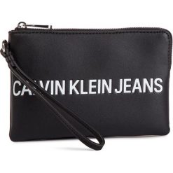 Torebka CALVIN KLEIN JEANS - Sculpted Logo Mini Wristlet K60K605269 001. Kopertówki marki Calvin Klein Jeans. Za 179.00 zł.