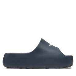 Klapki Tommy Jeans. Niebieskie klapki Tommy Jeans, bez wzorów, z jeansu, bez obcasa, bez zapięcia. Za 159.99 zł.