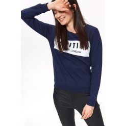 BLUZA NIEROZPINANA DAMSKA, Z NADRUKIEM. Bluzy TROLL, na jesień, s, bez wzorów, z bawełny, bez ramiączek, bez kaptura. Za 49.99 zł.