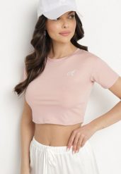 Jasnoróżowy T-shirt Crop Top Ozdobiony Literką Koliviela. Czerwone t-shirty Born2be, l, z aplikacjami, z jeansu, eleganckie, bez kołnierzyka, bez ramiączek. Za 39.99 zł.
