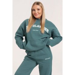 Bluza fitness damska Gym Glamour college. Czarne bluzy bez kaptura GYM GLAMOUR, xs, bez wzorów, bez kaptura, na fitness i siłownię. Za 169.99 zł.