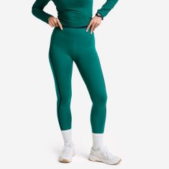 Legginsy fitness damskie Domyos. Zielone legginsy DOMYOS, bez wzorów, z elastanu, sportowe. Za 129.99 zł.