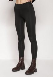 Czarne Klasyczne Legginsy z Regularnym Stanem Ralindia. Czarne legginsy Born2be, bez wzorów, z jeansu, klasyczne, długie. Za 39.99 zł.