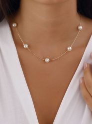Luja Bijoux Pozłacany naszyjnik z perłami - dł. 42 cm rozmiar: onesize. Żółte naszyjniki Luja Bijoux, z materiału, z perłą, metalowe. Za 48.28 zł.