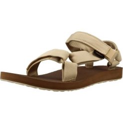 Sandały TEVA SANDALIA W ORIGINAL UNIVE Jasnobrązowy. Brązowe sandały Teva, bez wzorów, z tkaniny, bez obcasa, bez zapięcia. Za 281.99 zł.