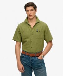 Superdry Krótka koszula teksturowana The Merchant Store – Relaxed fit. Zielone koszule Superdry, m, bez wzorów, z bawełny, klasyczne, bez kołnierzyka, bez ramiączek. Za 343.05 zł.