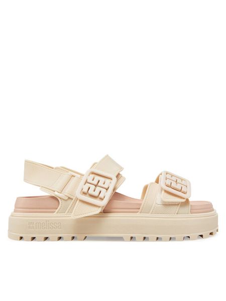 Melissa Sandały Melissa Towny Ad 35964 Beżowy. Brązowe sandały Melissa, bez wzorów, z tworzywa sztucznego, bez obcasa, na koturnie, bez zapięcia. Za 349.99 zł.