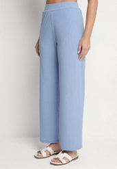 Niebieskie Prążkowane Spodnie Szerokie z Gumką w Pasie Drasia. Niebieskie jeansy Born2be, m, bez wzorów, z jeansu. Za 49.99 zł.