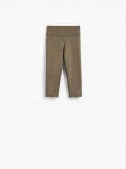 Legginsy capri - ciemnozielony. Zielone legginsy Reserved, bez wzorów, z dzianiny. Za 69.99 zł.