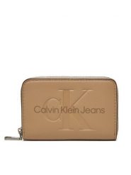 Calvin Klein Jeans Mały Portfel Damski Zip Around Mono K60K612255 Beżowy. Brązowe portfele Calvin Klein Jeans, bez wzorów, z jeansu. Za 159.99 zł.