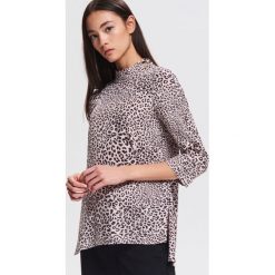 Bluzka w panterkę - Wielobarwn. Bluzki marki Reserved. Za 119.99 zł.