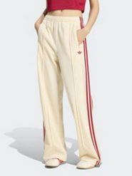 Adidas Spodnie dresowe w kolorze kremowym rozmiar: S. Brązowe spodnie dresowe adidas, bez wzorów, z dresówki. Za 209.95 zł.