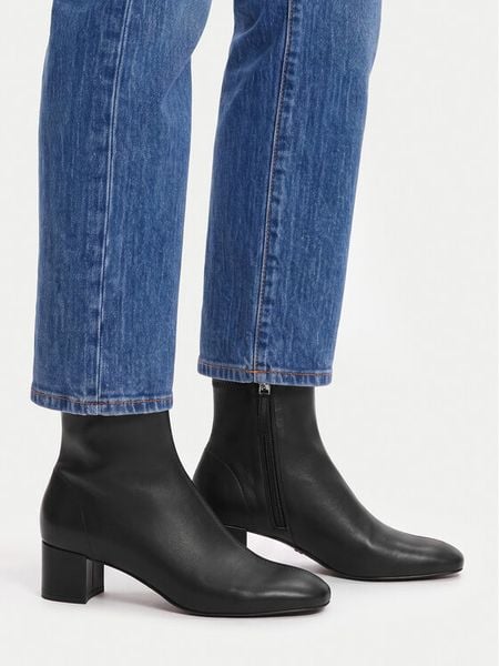 GINO ROSSI Botki C-TS6317-01 Czarny. Czarne botki Gino Rossi, bez wzorów, ze skóry, bez obcasa, na słupku, bez zapięcia. Za 349.99 zł.
