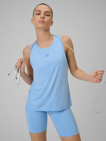 4F Top treningowy loose szybkoschnący damski - niebieski XS. Niebieskie topy 4f, xs, bez wzorów, ze skóry, bez kołnierzyka, bez ramiączek. Za 79.99 zł.