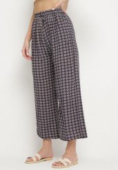 Granatowe Szerokie Spodnie z Wysokim Stanem w Geometryczny Wzór Sarivan. Niebieskie jeansy Born2be, l, bez wzorów, z bawełny, z podwyższonym stanem. Za 49.99 zł.