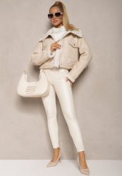 Białe Legginsy High Waist z Imitacji Skóry z Gumką w Pasie Ozdobione Guzikami Sinairis. Białe legginsy Renee, bez wzorów, z jeansu, biznesowe. Za 59.99 zł.