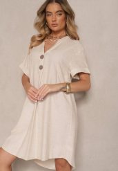 Jasnobeżowa Sukienka z Bawełny o Pudełkowym Kroju z Dużymi Guzikami Elanorella. Brązowe sukienki Renee, na co dzień, m, bez wzorów, z bawełny, eleganckie, bez kołnierzyka, bez ramiączek, kopertowe. W wyprzedaży za 75.99 zł.
