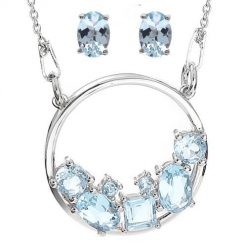 TARA komplet srebrnej biżuterii naszyjnik kolczyki blue topaz 4 ct. Niebieskie kolczyki Enaya, z jeansu, z granatem, metalowe. Za 542.00 zł.