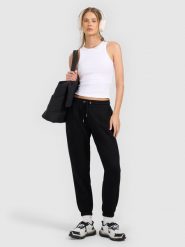 4F Spodnie dresowe joggery damskie - czarne L. Czarne spodnie dresowe 4f, bez wzorów, z dresówki, sportowe, z podwyższonym stanem, długie. Za 129.99 zł.