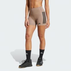 Legginsy Optime 3-Stripes 1/4 Short. Brązowe legginsy adidas, bez wzorów, sportowe. Za 199.00 zł.