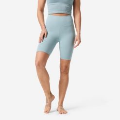 Legginsy krótkie do jogi i pilatesu Domyos. Niebieskie legginsy DOMYOS, bez wzorów, z materiału, krótkie. Za 69.99 zł.