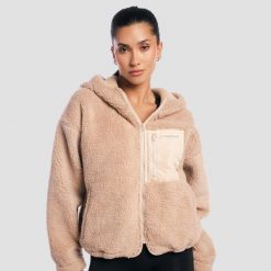 Kurtka damska fitness z kapturem oversize Sherpa Canyon. Brązowe kurtki GYMBEAM, m, bez wzorów, z materiału, z kapturem. Za 188.90 zł.