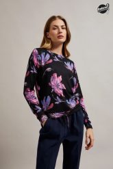 Sweter w kwiaty z długimi rękawami fioletowy. Fioletowe swetry MOODO, m, bez wzorów, z elastanu, bez ramiączek. W wyprzedaży za 34.99 zł.