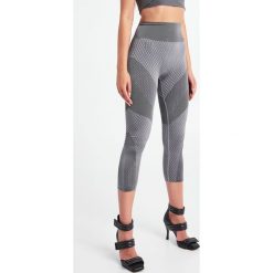 LEGGINSY LEELOO WOLFORD. Szare legginsy Wolford, bez wzorów. W wyprzedaży za 323.40 zł.
