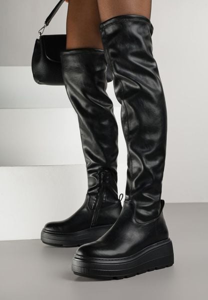 Czarne Kozaki na Grubej Podeszwie w Stylu Cyber Anendria. Czarne kozaki Born2be, bez wzorów, z jeansu, eleganckie, bez obcasa, na płaskiej podeszwie, bez zapięcia. Za 149.99 zł.