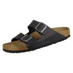 Klapki Birkenstock Arizona WB. Czarne klapki Birkenstock, bez wzorów, z materiału, bez obcasa, bez zapięcia. Za 469.00 zł.