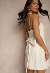 Beżowa Sukienka o Rozkloszowanym Kroju na Ramiączkach z Dużą Kokardą Ivelvia. Brązowe sukienki Renee, na co dzień, m, bez wzorów, eleganckie, bez kołnierzyka, bez ramiączek, mini, dopasowane. Za 139.99 zł.