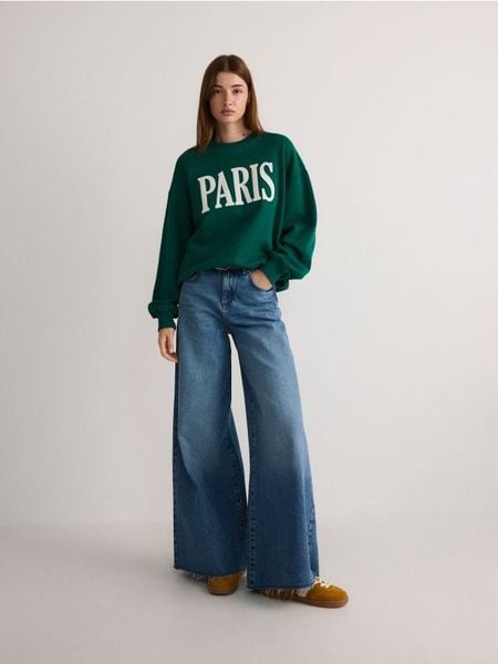 Bluza oversize z nadrukiem - zielony. Zielone bluzy Reserved, l, bez wzorów, z bawełny, bez ramiączek, bez kaptura. W wyprzedaży za 69.99 zł.