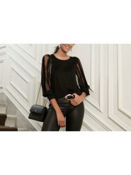 Milan Kiss Bluzka w kolorze czarnym rozmiar: M. Czarne bluzki Milan Kiss, m, bez wzorów, bez kołnierzyka, bez ramiączek. Za 126.99 zł.