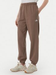 The North Face Spodnie dresowe Evolution Simple Dome NF0A8CWV Brązowy jasny Regular Fit. Brązowe spodnie dresowe The North Face, bez wzorów, z bawełny. Za 279.99 zł.