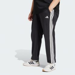 Spodnie Essentials 3-Stripes French Terry Cuffed. Białe spodnie dresowe adidas, bez wzorów, z materiału. Za 229.00 zł.
