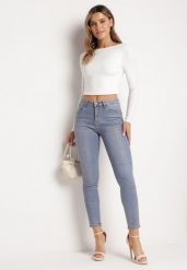Jasnoniebieskie Jeansy Skinny z Bawełny Ozdobione Złotą Farbą Taidda. Niebieskie jeansy Born2be, l, z aplikacjami, z bawełny, eleganckie. Za 159.99 zł.