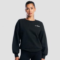 Bluza damska fitness oversize czarna Base. Czarne bluzy GYMBEAM, m, bez wzorów, z bawełny, bez ramiączek, bez kaptura. Za 127.90 zł.