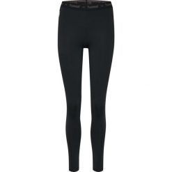 Legginsy termoaktywne damskie Hummel First Performance Women Tights. Czarne legginsy Hummel, bez wzorów, sportowe. Za 118.00 zł.