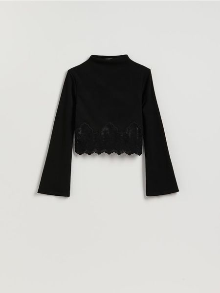 Bluzka z koronką - czarny. Czarne bluzki Reserved, l, bez wzorów, z dzianiny, bez kołnierzyka, bez ramiączek. Za 109.99 zł.