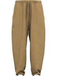 Under Armour Spodnie dresowe "Icon" w kolorze jasnobrązowym rozmiar: S. Brązowe spodnie sportowe Under Armour, bez wzorów, z bawełny. Za 188.40 zł.