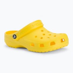 Klapki Crocs Classic. Żółte klapki Crocs, bez wzorów, bez obcasa, bez zapięcia. Za 89.99 zł.