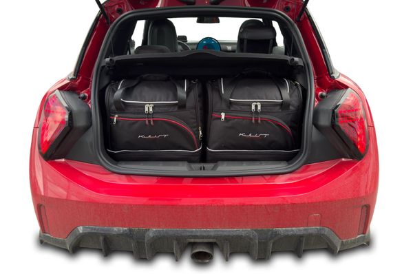 Torby Do Bagażnika Mini Cooper 3D 2024+ 2Szt Kjust. Czarne torby podróżne KJUST, bez wzorów, z kauczuku. Za 486.00 zł.